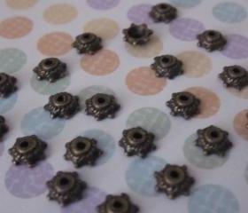 Tibetan Tiny Antique Bronze Bead Caps (24)